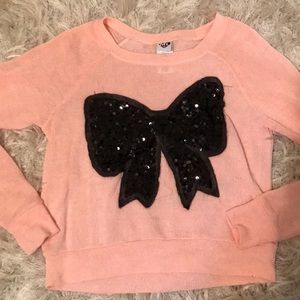 Sequin bow knit long sleeve top